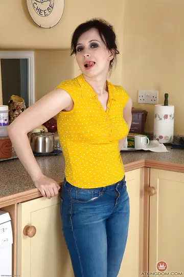 Mature Chubby Woman with Big Tits Spreads Her Hairy Pussy in the Kitchen