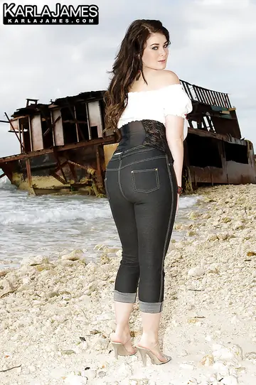 Karla James – Brunette with Big Natural Tits Strips Out of Her Jeans on the Beach