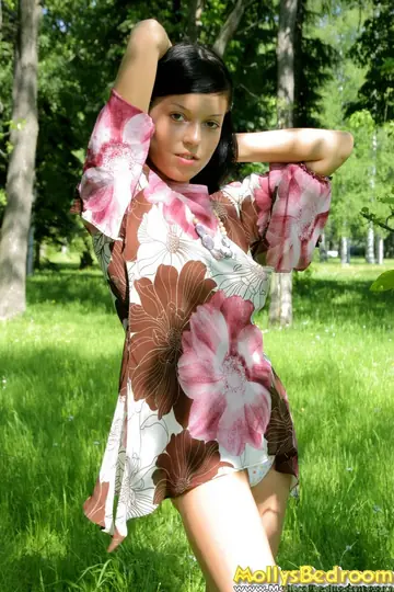Busty Brunette Lifts Her Skirt and Spreads Outdoors