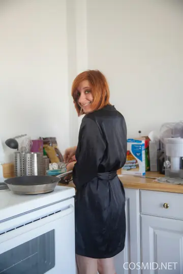 Redhead with Big Natural Tits Strips Out of Her Satin Robe