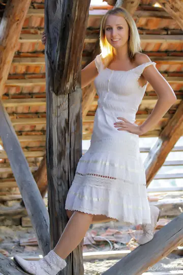 Blonde Strips Out of Her Skirt and Boots Outdoors