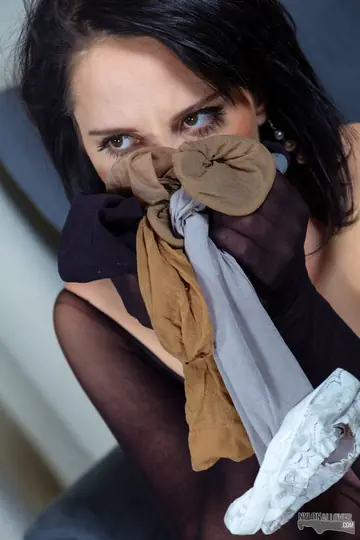 Busty Thick Brunette Poses in Lingerie and Stockings