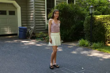 Nadia Noja – Slim Brunette in a Skirt Spreads Her Pussy Outdoors