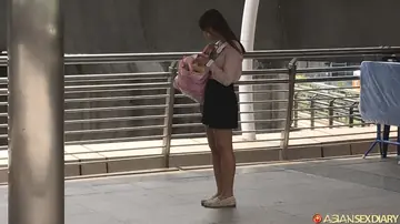 Tall Asian Brunette Lifts Her Dress and Shows Her Hairy Pussy