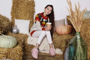 Leona Mia – Skinny Brunette Strips Her Top Off on Straw Bales