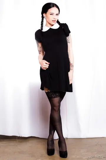 Necro Nicki – Tattooed Brunette in Pigtails Spreads in Stockings and Garters