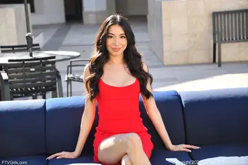 Woman Lifts Her Dress and Plays with Shaved Pussy in Heels
