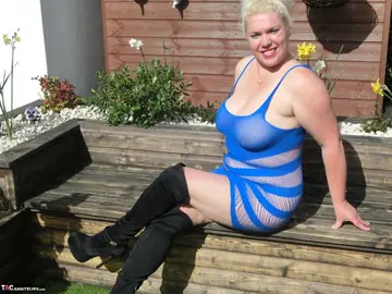 Curvy Blonde MILF in Boots Fucks a Partner and Uses a Wooden Dildo