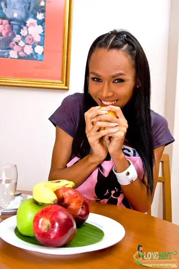 Trans Woman Poses Nude in the Kitchen with a Banana