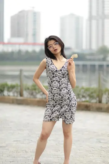 Petite Asian Woman Strips Out of Her Dress in Public