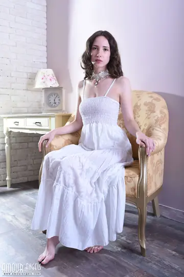 Brunette Lifts Her Dress and Spreads Her Shaved Pussy Standing