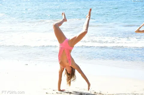Marry Lynn: Slim Brunette with Natural Tits Spreads on the Beach – photo 10 of 20