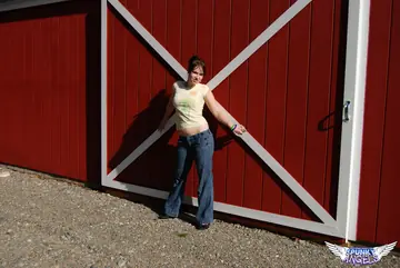 Emily Love – Amateur Brunette Pulls Down Her Jeans and Masturbates in a Barn