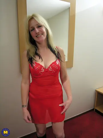 Mature European Blonde Strips Out of Her Red Dress and Fucks in Boots