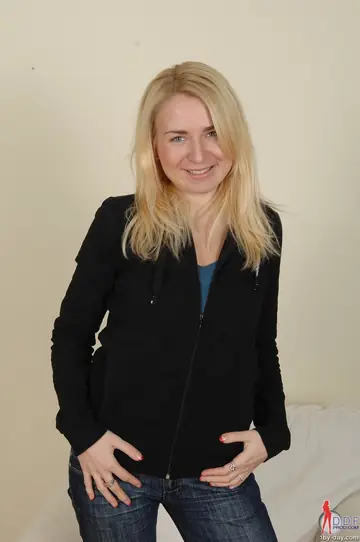 Thick European Blonde Strips Out of Her Jeans and Spreads on the Sofa