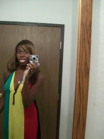 Ebony Babe with Big Tits Spreads in a Dress Selfie