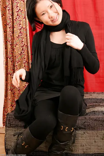 Petite Asian Babe in Pantyhose and Boots Spreads Her Pussy