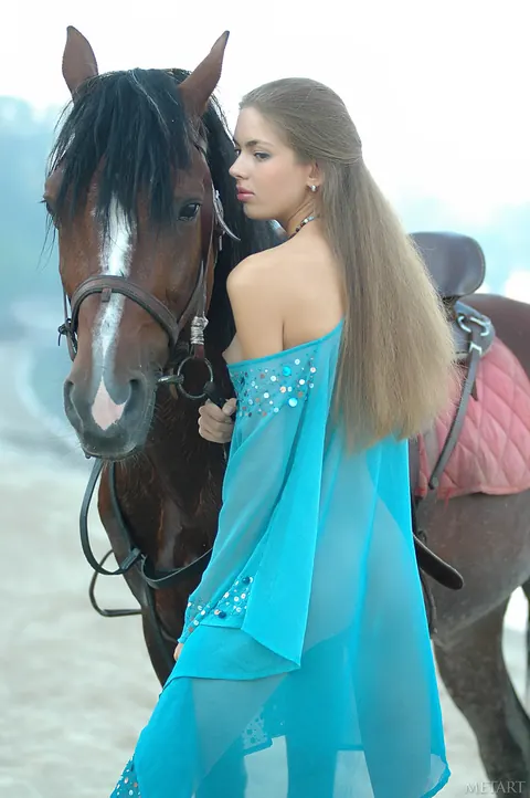 Bambola: Slim Russian MILF Poses Topless Outdoors with Horses – photo 3 of 17