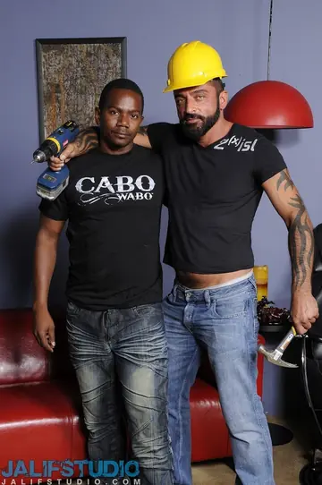 Hairy Tattooed Stud Fucks Ebony Man in Gay Anal Threesome
