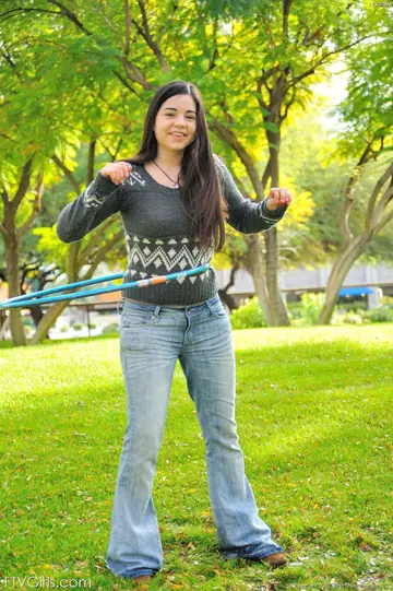 Busty Latina Brunette Strips Out of Her Jeans and Plays with Hula Hoop