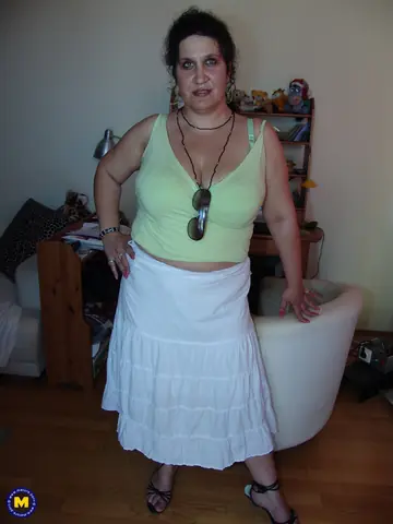 Mature Hairy BBW Strips and Takes a Baseball Bat in Her Pussy