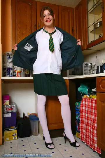 Isabela Kay – British Redhead Strips Out of Her Uniform and Fingers Herself in the Kitchen