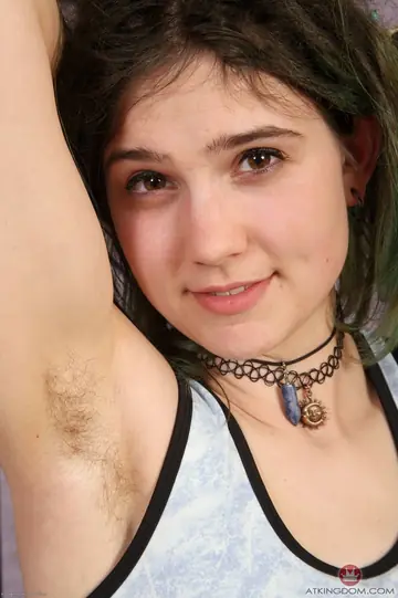 Short-Haired Amateur Displays Hairy Armpits and Pussy at the Gym