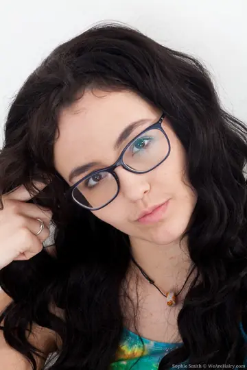 Tall German Brunette Spreads Her Hairy Pussy on the Chair in Glasses