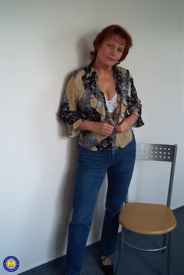 Mature European Woman Undresses and Shows Her Shaved Pussy