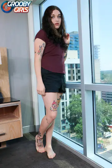 Trans Woman with Tattoos Undresses and Poses Nude