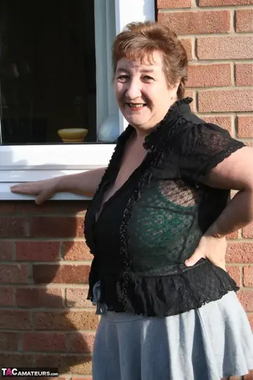 Kinky Carol – Mature Curvy Brunette Poses in Lingerie and Pantyhose Outdoors