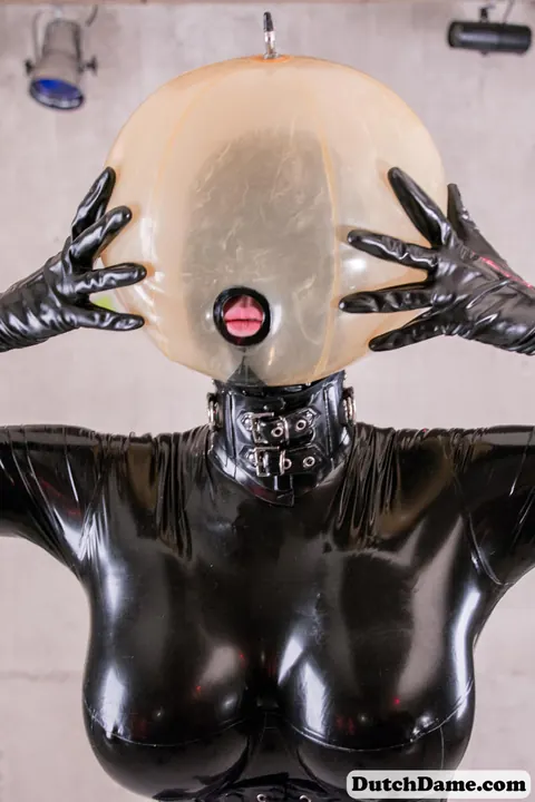 Woman in Latex Bound in Dungeon – photo 13 of 16