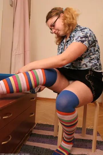 BBW in Socks and Glasses Strips to Show Her Big Tits