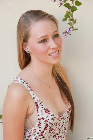 Slim Blonde Shows Off Her Legs in Shorts Outdoors