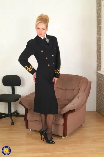 Mature Blonde MILF Strips Out of Her Uniform and Pantyhose to Spread Her Pussy