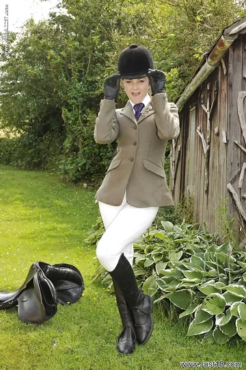 Woman Strips Out of Her Uniform and Boots on the Lawn