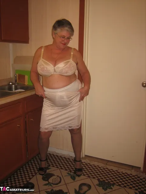 Curvy Short-Haired MILF Strips Off Her Lingerie in the Kitchen – photo 9 of 20