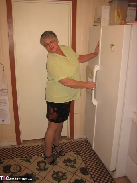 Curvy Short-Haired MILF Strips Off Her Lingerie in the Kitchen – photo 1 of 20