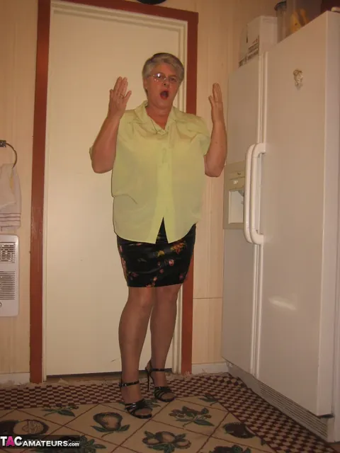 Curvy Short-Haired MILF Strips Off Her Lingerie in the Kitchen – photo 3 of 20