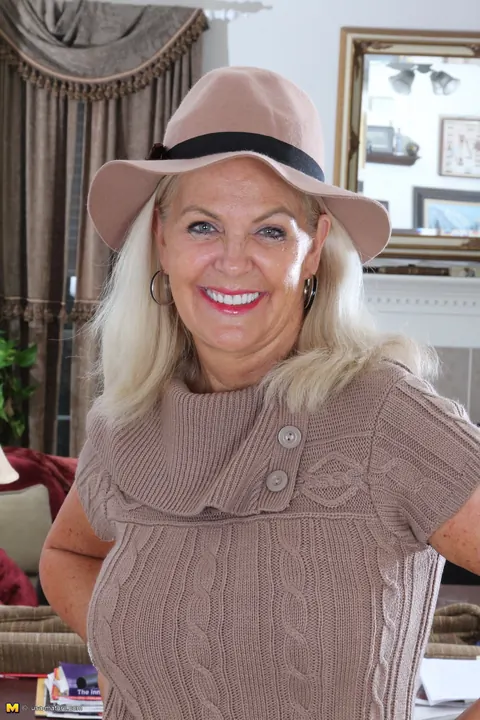 Judy Belkins: Mature Blonde Woman Peels Off Her Pantyhose and Skirt – photo 7 of 16