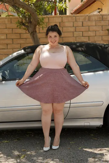 PAWG Brunette Shows Her Big Ass in a Skirt and Panties Outdoors