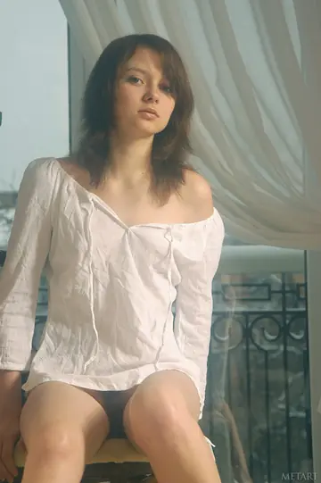 Woman Undresses to Show Her Hairy Pussy