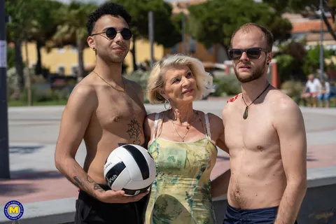 Mature Blonde Sucks Two Cocks in a Public Threesome – photo 3 of 11