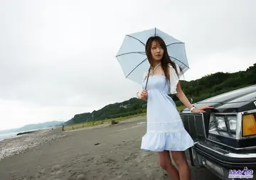 Kurara – Japanese Redhead Flashes Her Tits on the Beach