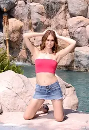 Petite Redhead Strips Poolside in a Skirt and Heels