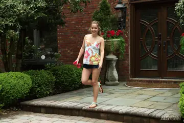 Blonde Fingers Her Ass and Rides a Dildo in the Garden Skirt