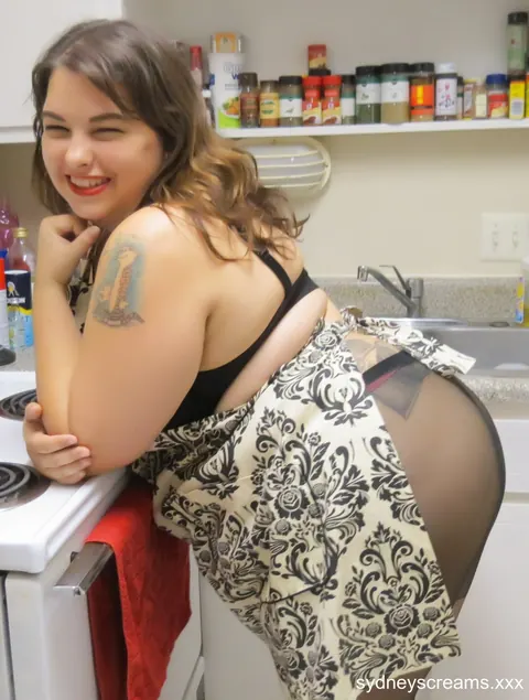 Sydney Screams: Curvy Brunette MILF in Pantyhose Poses in the Kitchen – photo 10 of 16