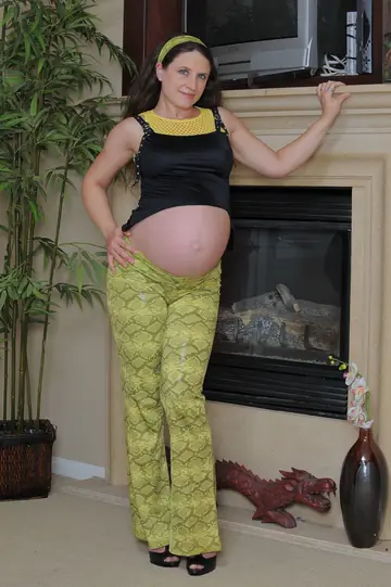 Pregnant MILF Shows Her Hairy Pussy and Big Tits