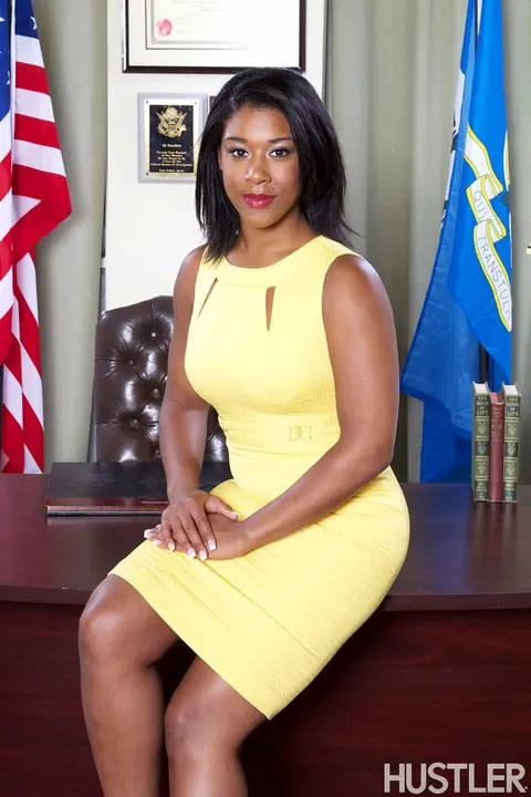 Megan Vaughn: Ebony MILF Undresses for a Threesome in the Office – photo 1 of 15