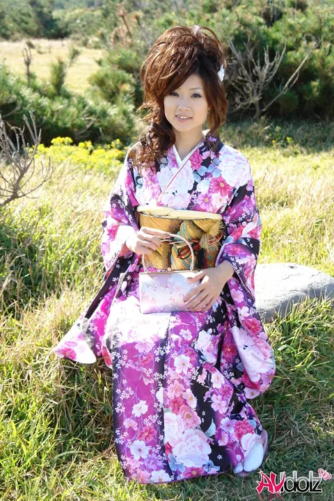 Asian Brunette Poses in a Kimono on the Beach – photo 2 of 15